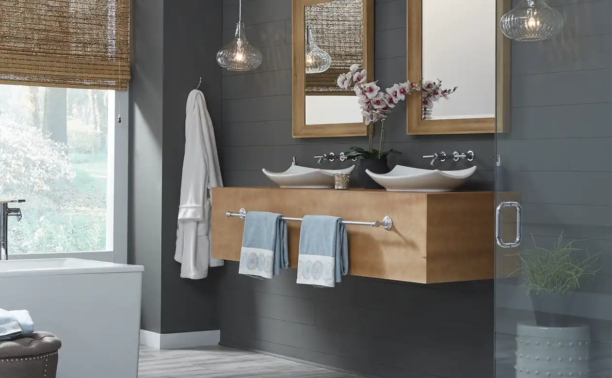 Floating wooden vanity with metal fixtures at Ramey Floor & Home